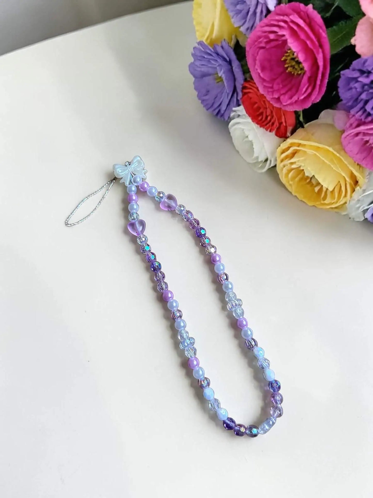 Lavender Haze handmade beaded phone chain with purple lilac iridescent crystals by Enchanted Bookcase"