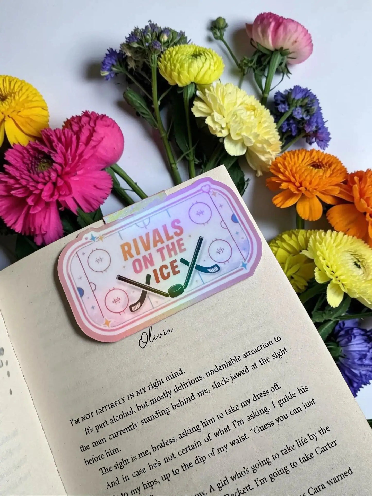 Rivals on the Ice hockey rink holographic magnetic bookmark holding the page in an open book by Enchanted Bookcase